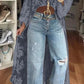 Asymmetrische top met opstaande kraag en pofmouwen