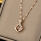 Strass hanger met gouden koperen en titanium stalen ketting