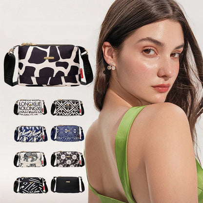 Crossbodytas met meerdere zakken en print voor dames