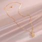 Strass hanger met gouden koperen en titanium stalen ketting