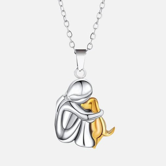 Meisje dat Hond Knuffelt – Oorknopjes en Ketting