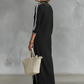 Minimalistische jurk met button-down kraag en contrasterende ran