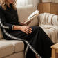 Minimalistische jurk met button-down kraag en contrasterende ran