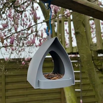 Hangende vogelvoederbak voor in de tuin met afda