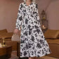 Maxi-jurk met V-hals, getailleerde taille, bloemenprint en lange mouwe