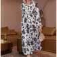 Maxi-jurk met V-hals, getailleerde taille, bloemenprint en lange mouwe