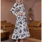 Maxi-jurk met V-hals, getailleerde taille, bloemenprint en lange mouwe
