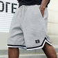 Sportshorts met trekkoord in de taille en gestreepte zoom