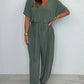 Effen gekleurde jumpsuit met V-hals en losse taille