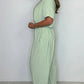 Effen gekleurde jumpsuit met V-hals en losse taille