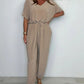 Effen gekleurde jumpsuit met V-hals en losse taille