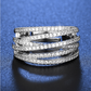 💫 50% KORTING! 💥 Verstelbare ring met gekruiste rijen – Schitterende zirkonia-steentjes, open band en spiegelafwerking – Ideaal voor dagelijks gebruik, op kantoor en voor feestjes