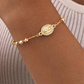 Elegante armband met stras kruisje